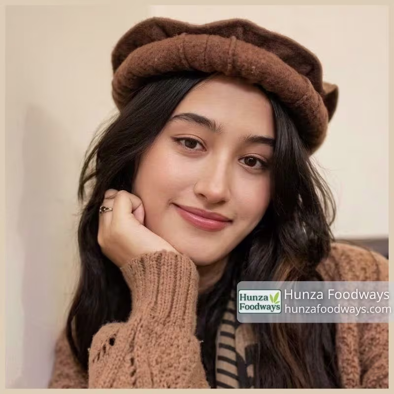 Brown Chitrali Handmade Woolen Cap worn by chitrali girl